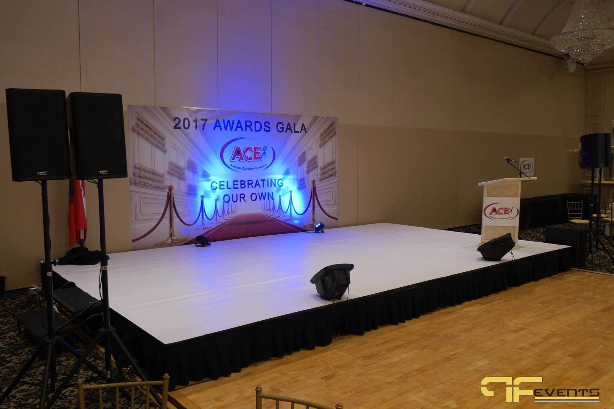 Skirted stage, wedges, lectern and speakers ready for the ACE Awards Gala