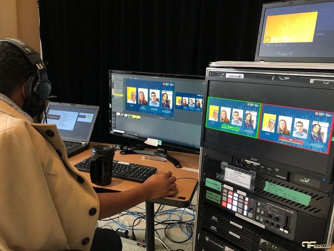 Operator switching a virtual panel layout on a rack-mounted video switcher
