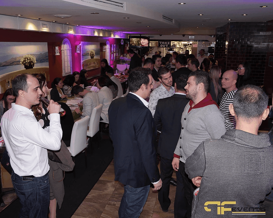Crowd mingling at Mashu Mashu during the OneMatch registration event