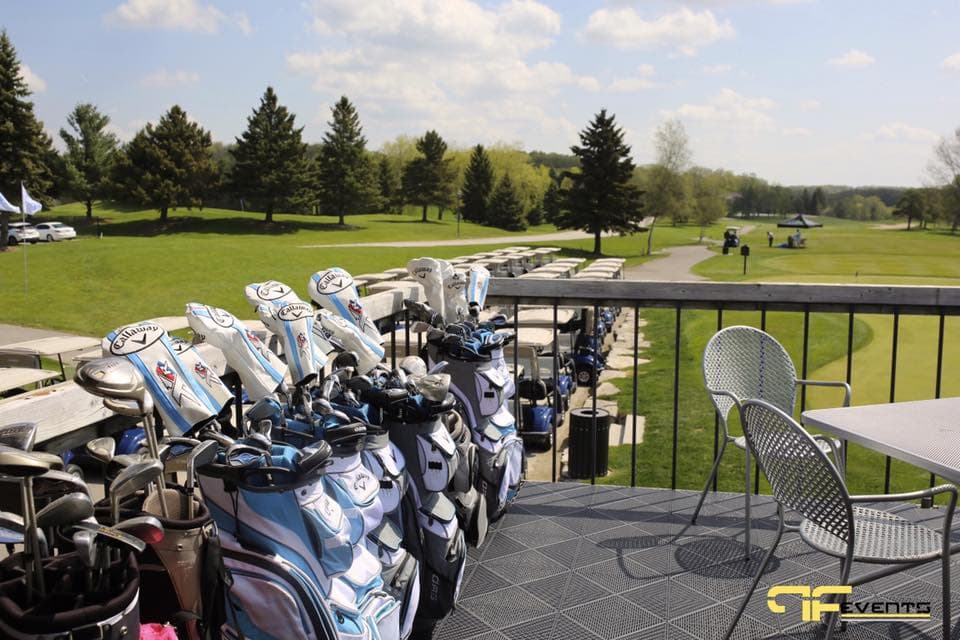 Golf bags at the bag drop above the carts at Nobleton Lakes Golf Club
