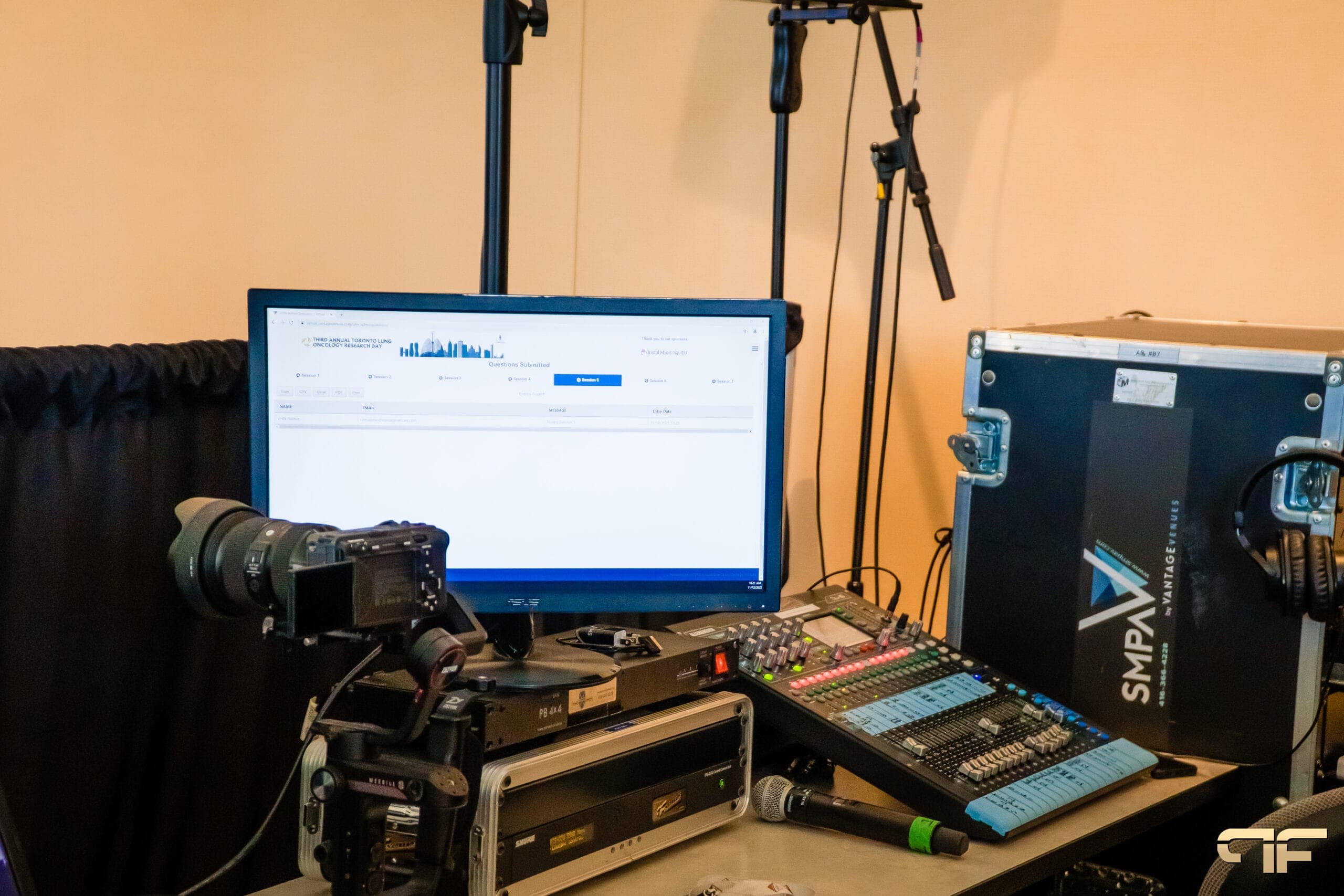 Mixer, camera and Q&A monitor beside a Vantage Venues SMPA road case